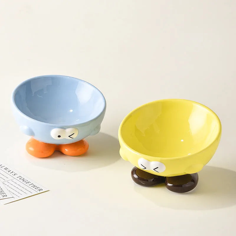 Blue oblique tall ceramic bowl for cat or dog food, designed for cervical spine support.