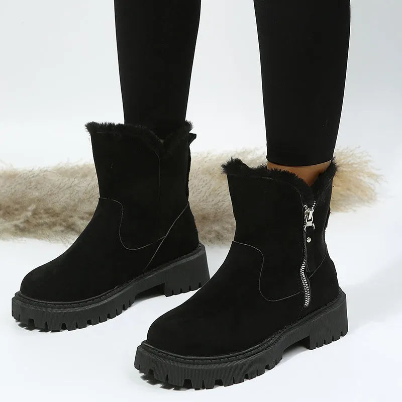 Black women's high-top snow boots with faux suede upper, side zipper, and thick plush lining.