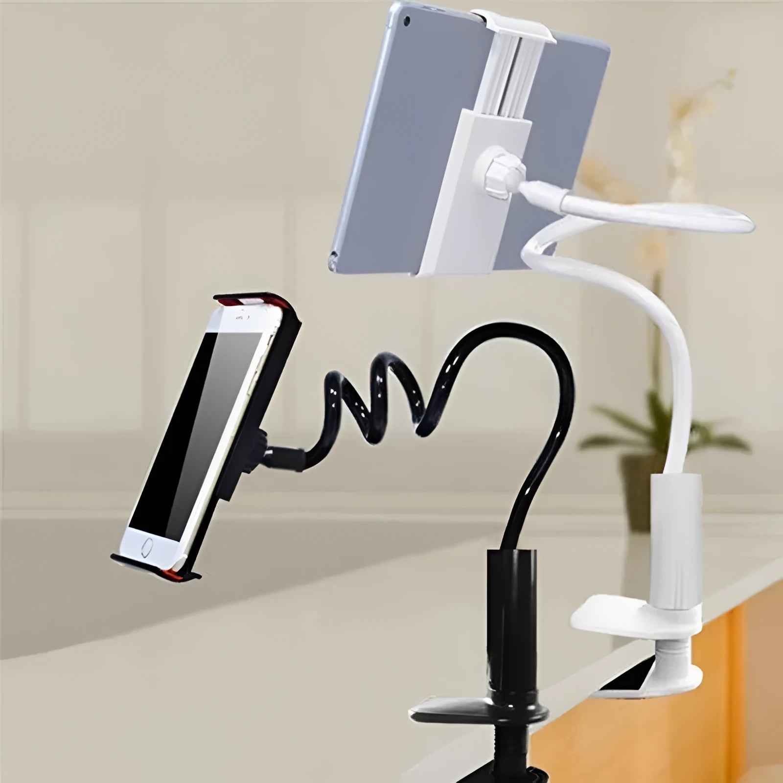 Flexible mount holder with bendable arm and suction base holding tablet at angle