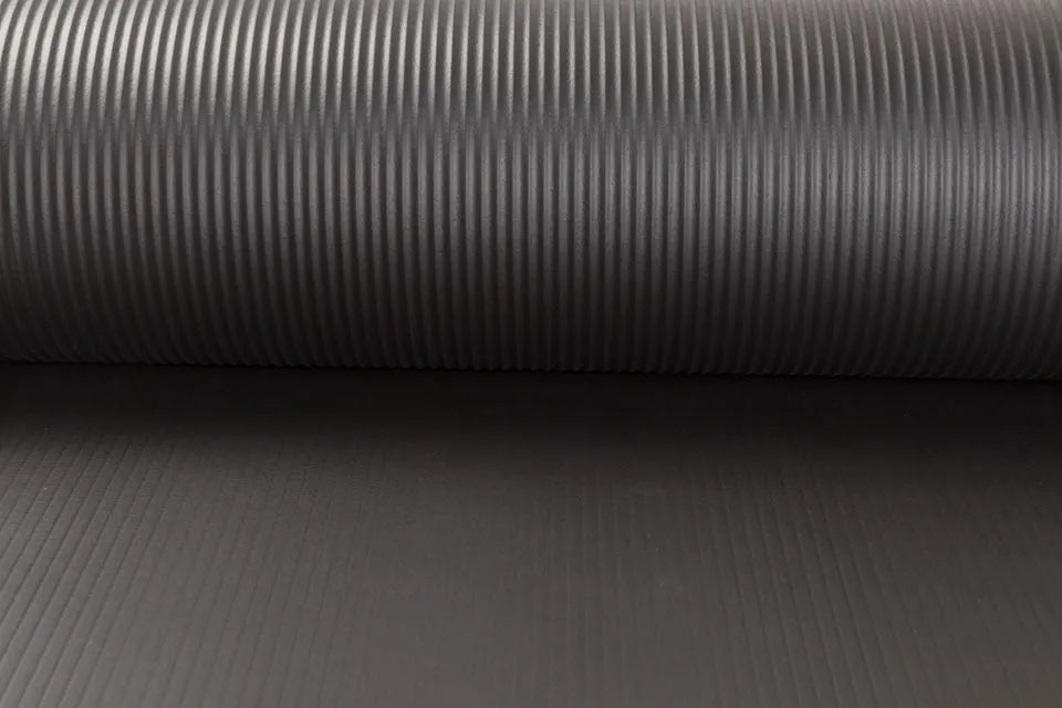 Female universal sports yoga mat in black, 10mm thick NBR foam, 183x61cm, with tied rope net bag