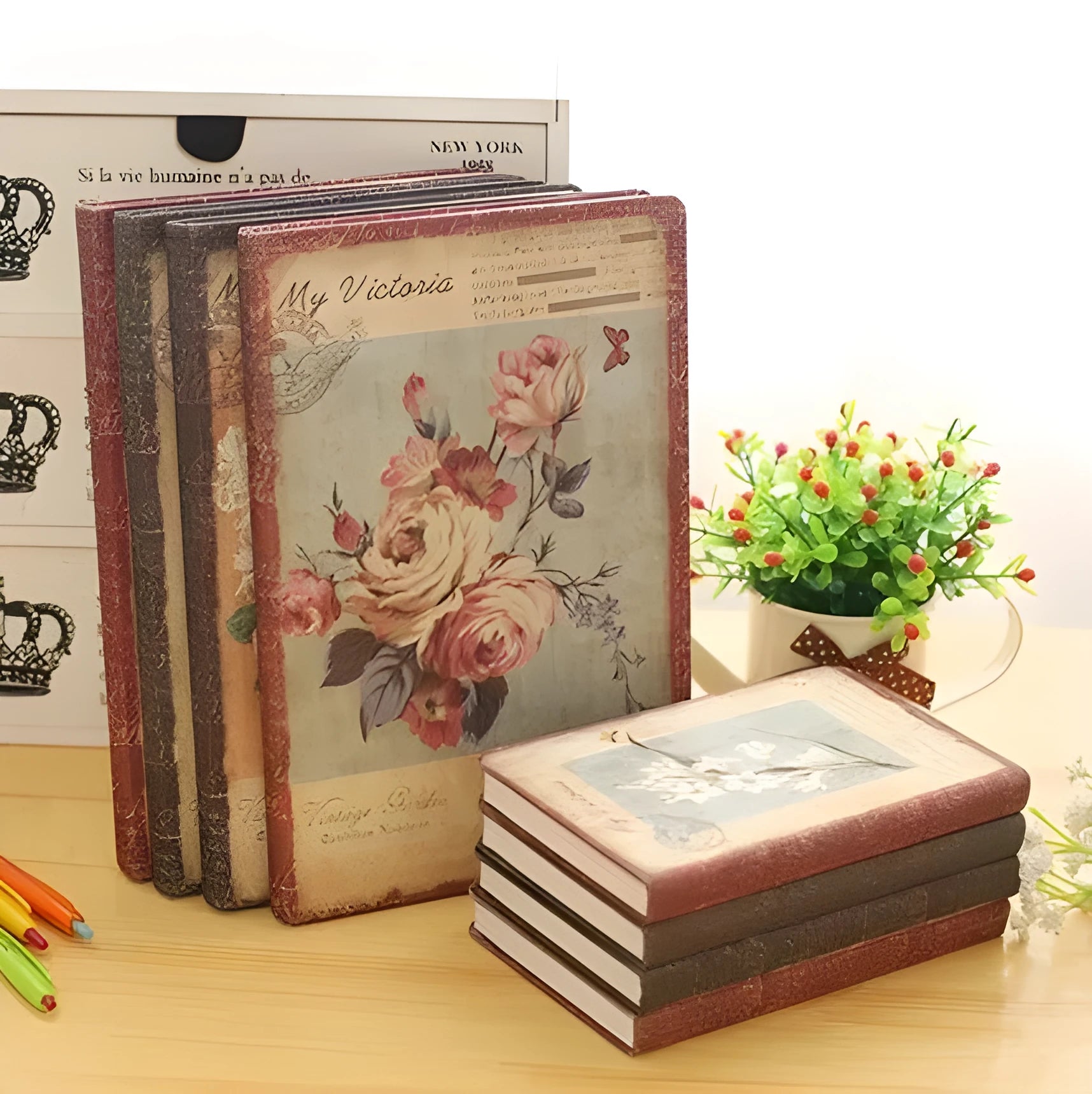 Hardcover notebook with retro floral cloth cover in Lily colour, showing 25K size next to 50K size comparison