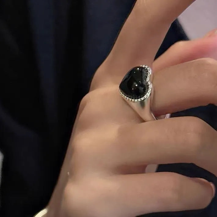 Adjustable S925 sterling silver ring with black agate heart design