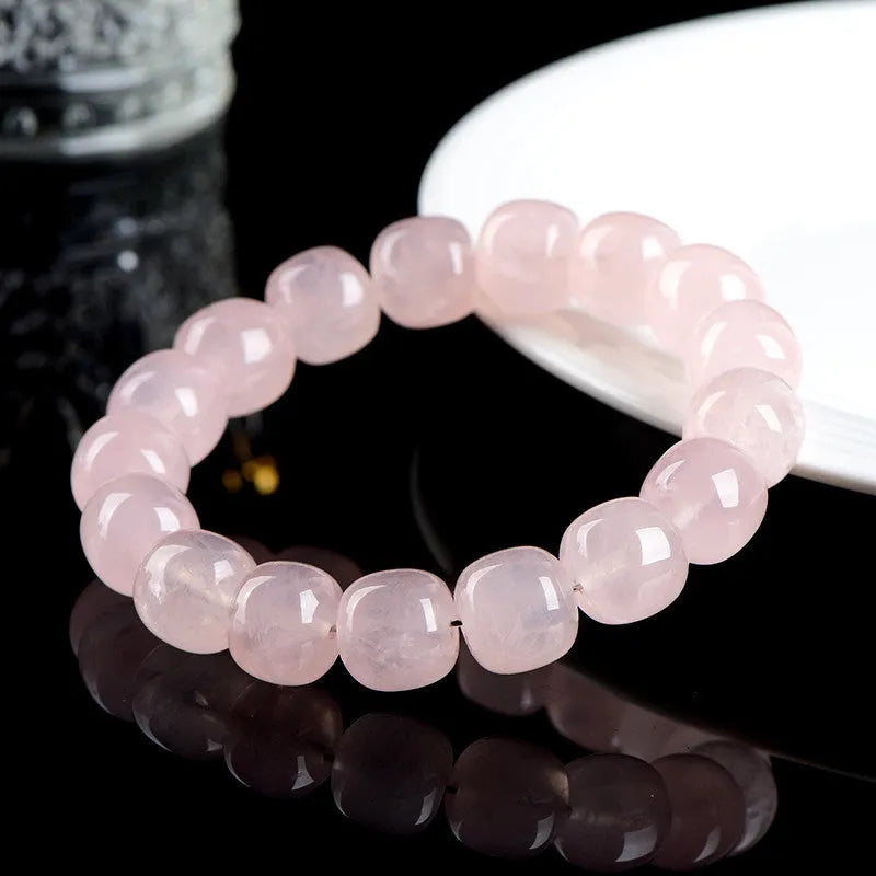Natural bamboo style crystal barrel bead bracelet in pink with 11-12mm geometric beads