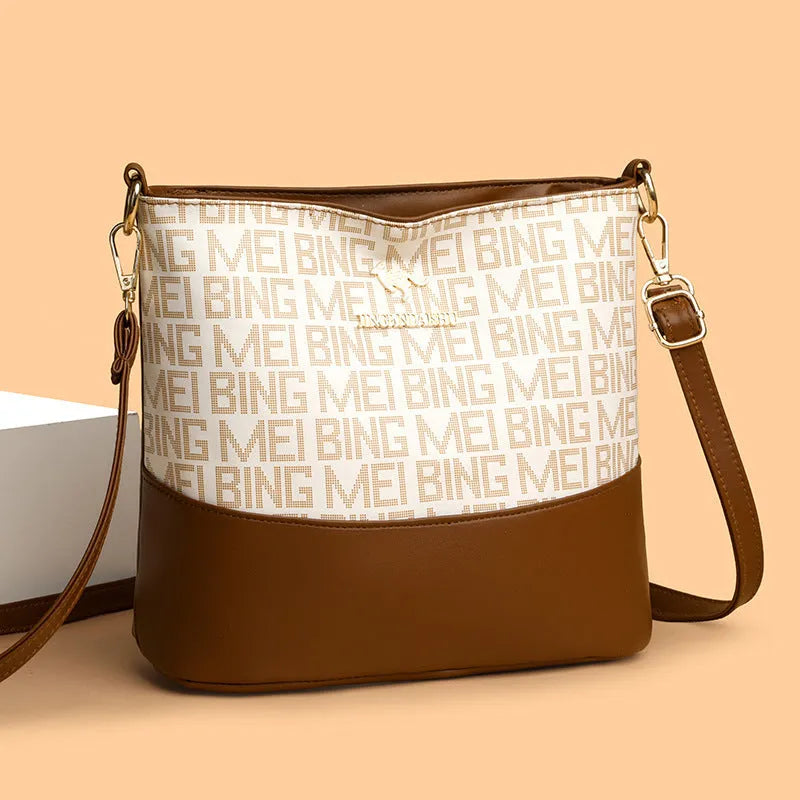Brown soft leather messenger bag showing three-dimensional pocket and internal organisation compartments