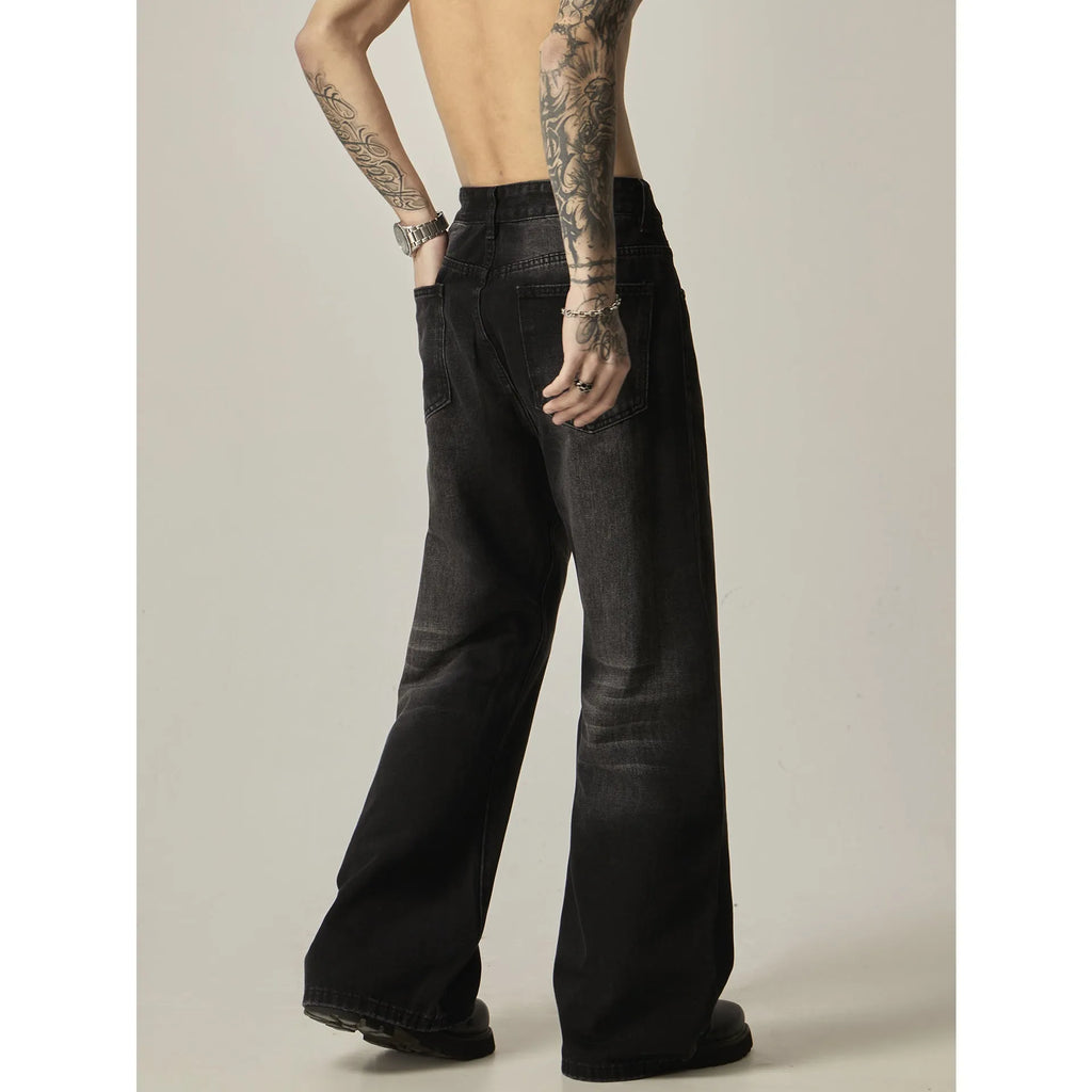 Black loose straight leg jeans with American retro styling and zipper fly front.