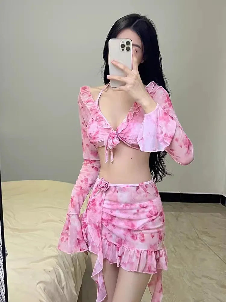 Women's floral bikini swimsuit in cherry blossom pink on a mannequin