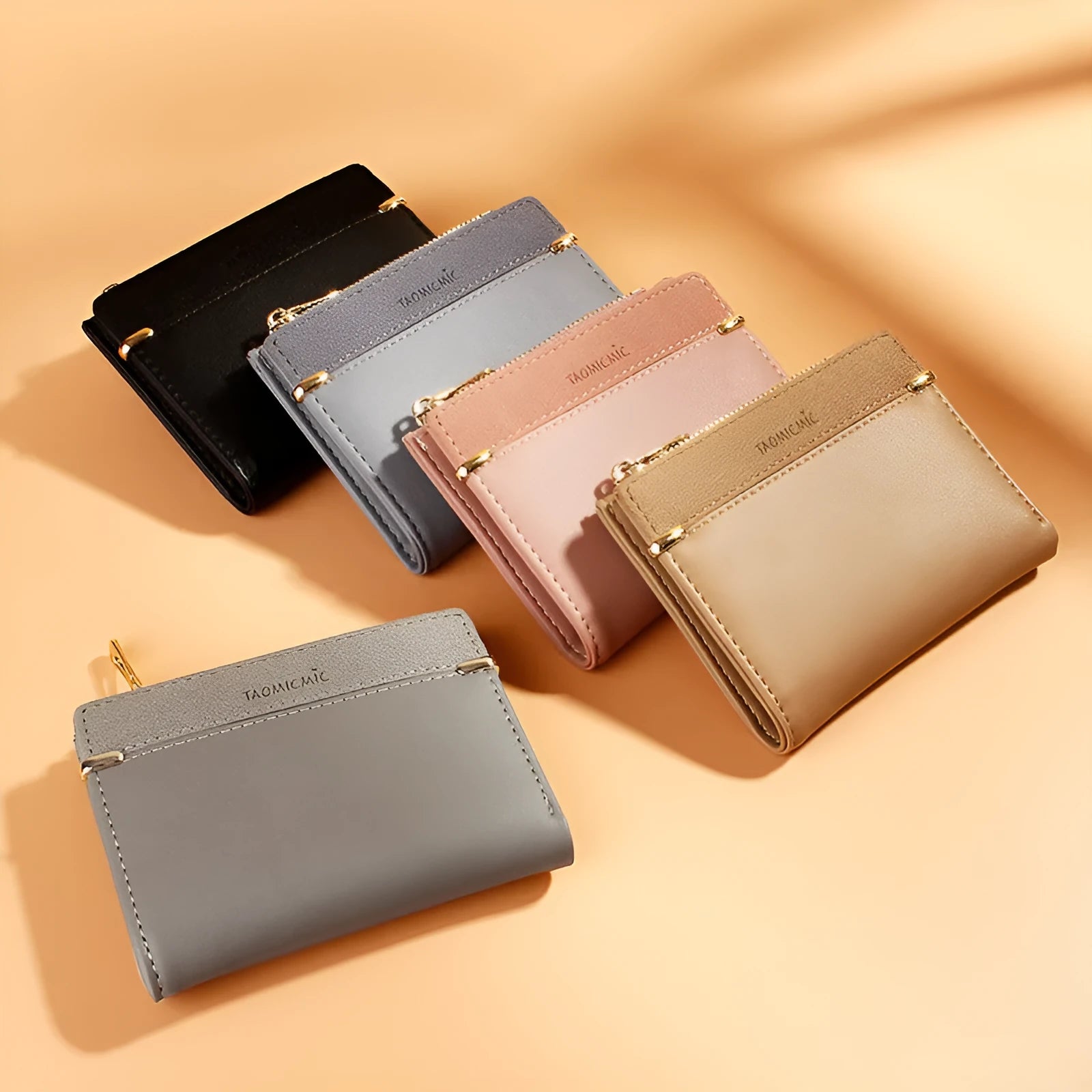 Short black PU leather ladies wallet unfolded to show card slots, coin zipper, bill holder, and hidden compartment.