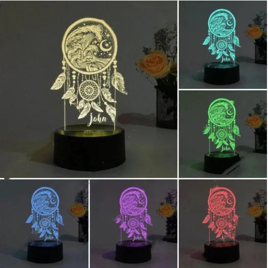 Black-based dream catcher night light with colourful acrylic shade and remote control.
