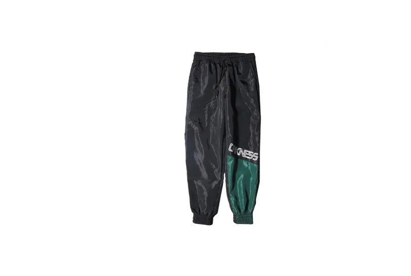 Japanese hip hop trousers with hit colour stitching, letter print, and bouquet foot detail in green low-waist drawstring style
