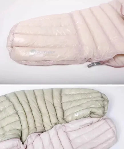 Ultra-light nylon down-filled envelope sleeping bag for camping with duck down insulation in outdoor setting