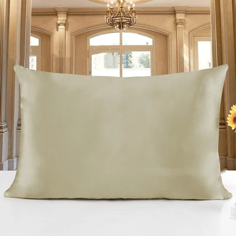 19 M double-sided silk pillowcase shown in one of 14 available colours, including apricot, sky blue, and black.