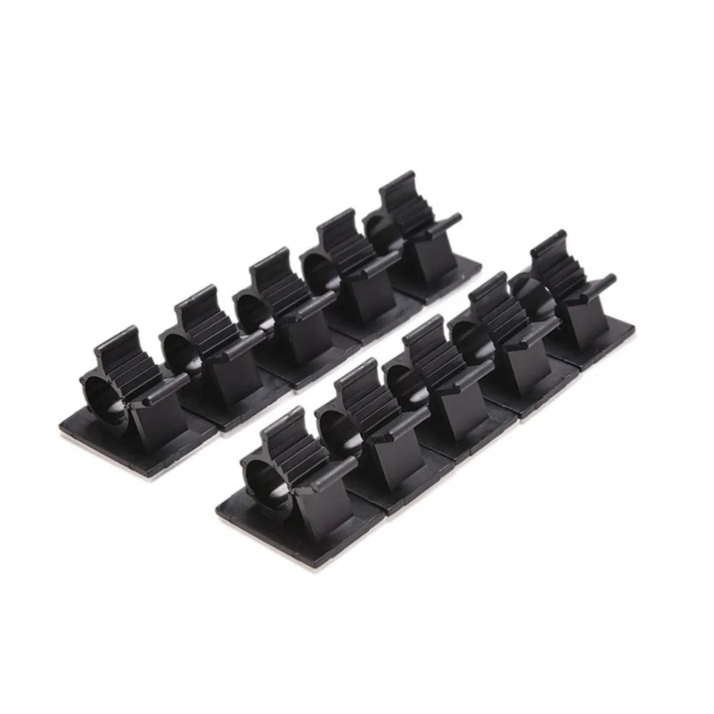 Ten black nylon adhesive cable clamps with two-stage lock design for 13mm cables.