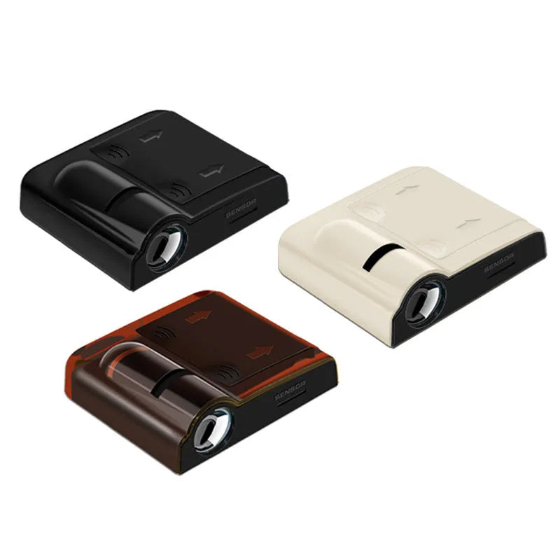 Black and beige universal car decorative projection radium lamp with compact ABS plastic casing.