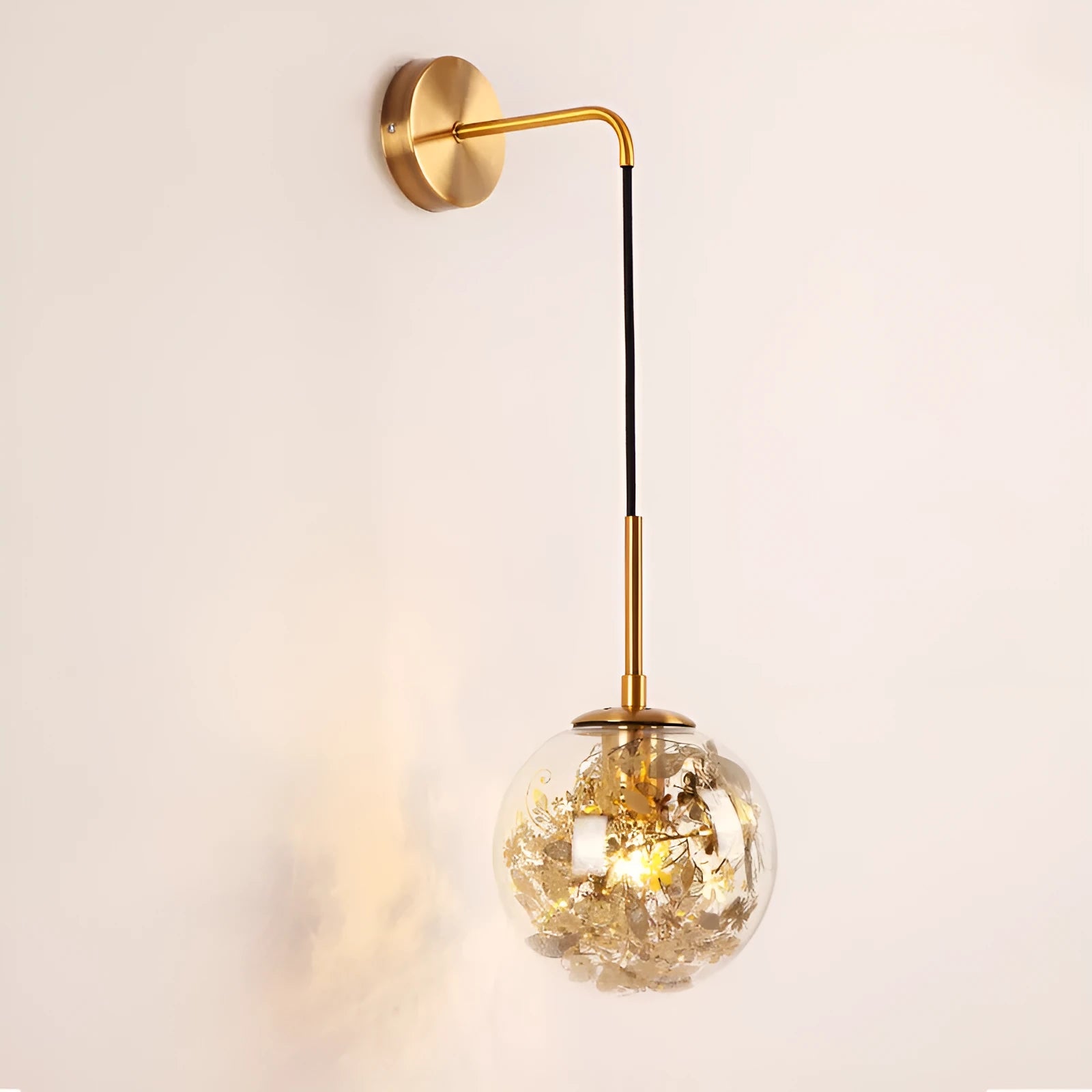Modern glass wall lamp in golden flower finish with LED bedside lighting