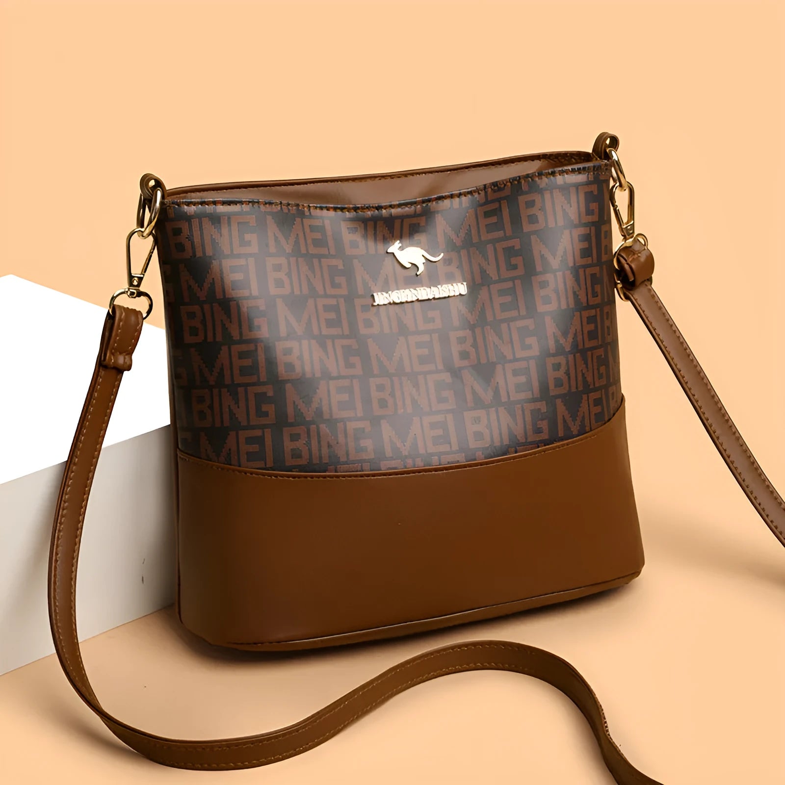 Brown soft leather messenger bag showing three-dimensional pocket and internal organisation compartments
