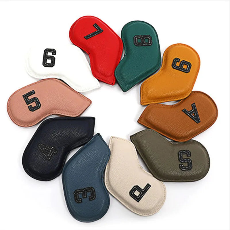 Set of 10 multi-coloured PU golf club head covers with ball head design on a golf bag.