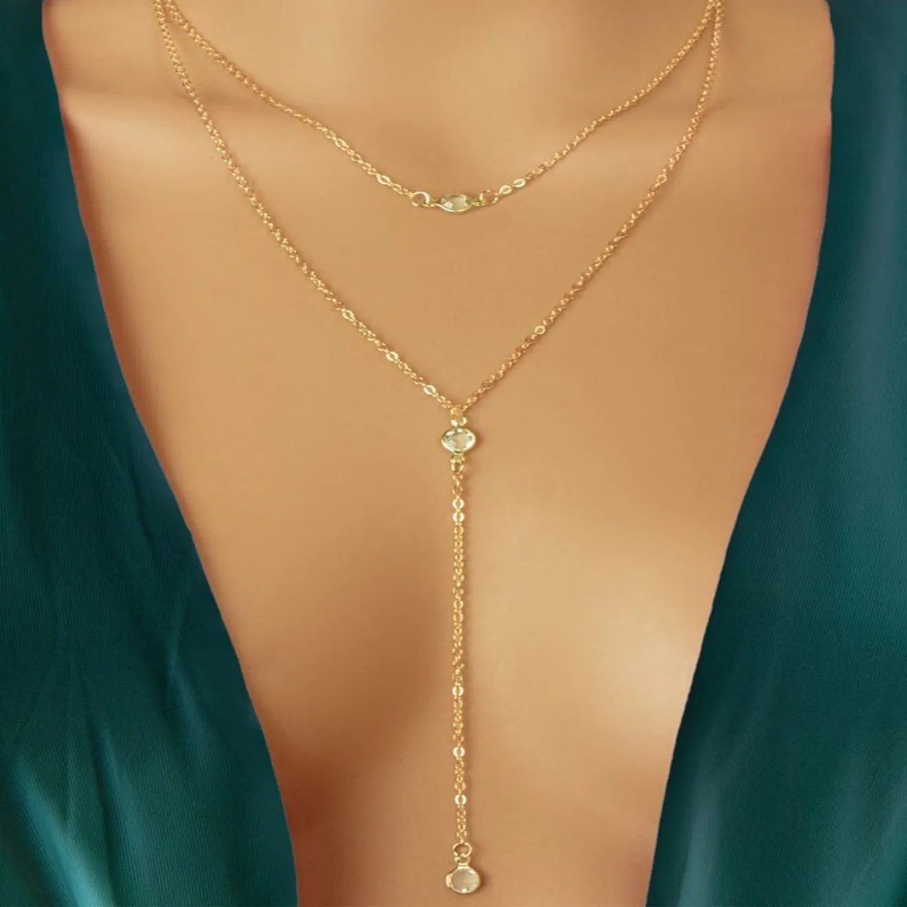 Alloy geometric pendant necklace with electroplated gold finish and O-ring chain on woman