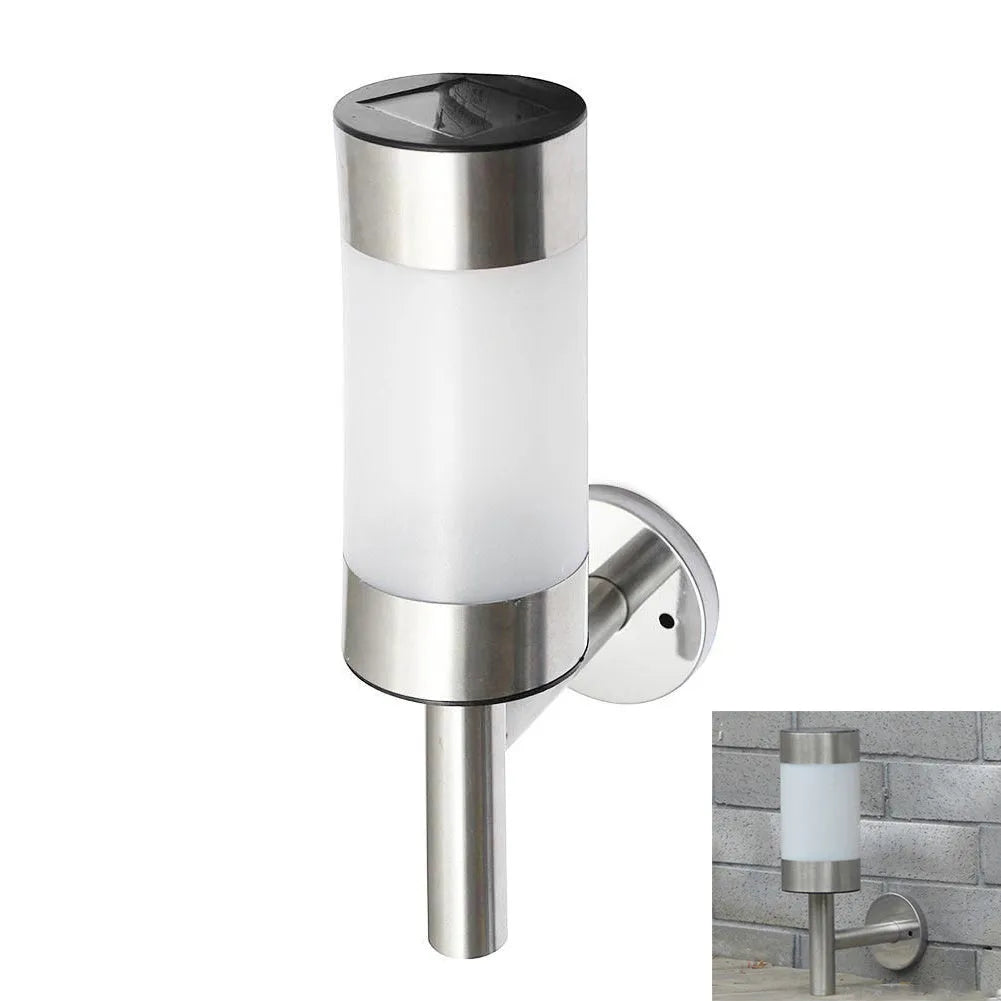 White solar-powered outdoor wall light with solar panel on top, showing plastic and stainless steel construction.