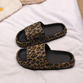 Women's leopard print EVA slippers with thick sole on a white background
