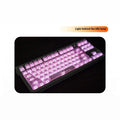 White transparent mechanical keyboard keycap set with side carving details on a dark background.