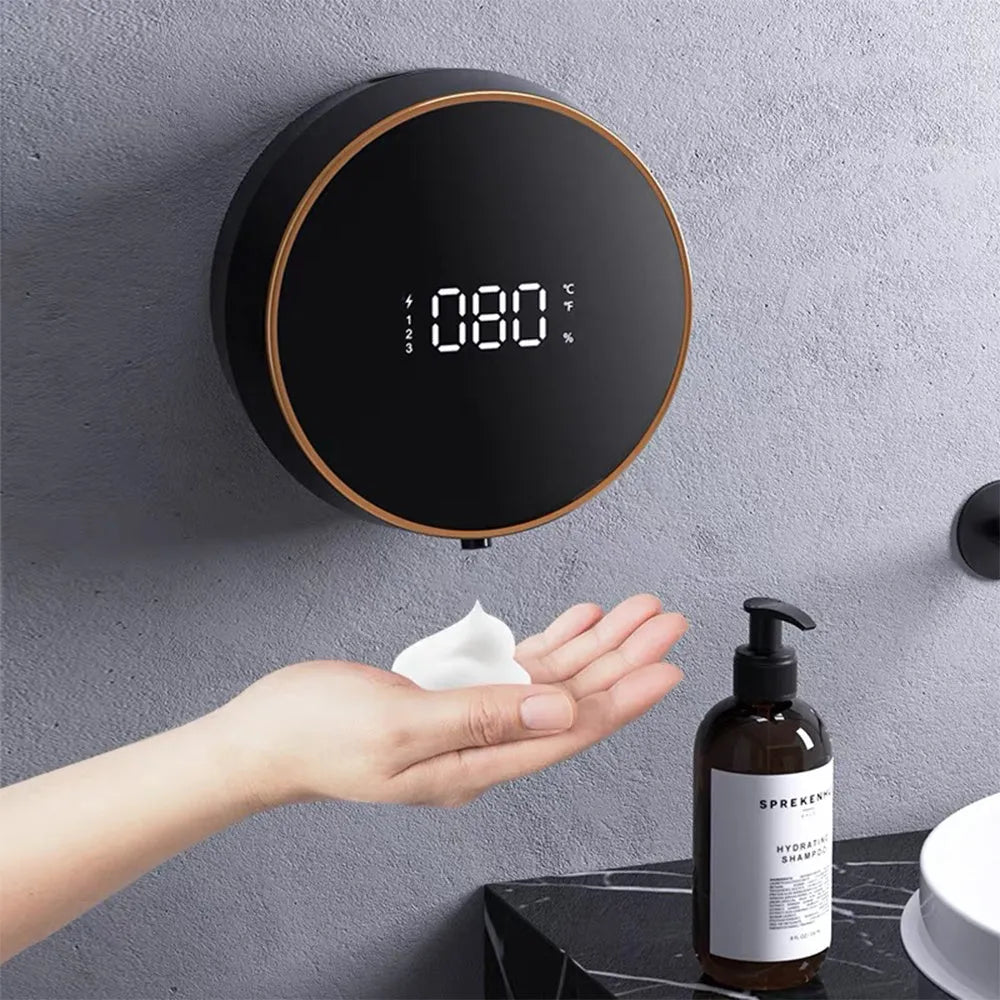 Black automatic sensing foam dispenser with USB charging port mounted on bathroom wall
