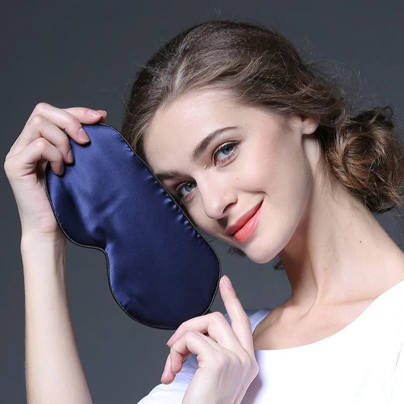 Double-sided mulberry silk eye mask with embroidered print in a selection of colours.