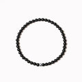Fine unisex bracelet with blue San, black agate, and obsidian beads in a geometric 4mm design.