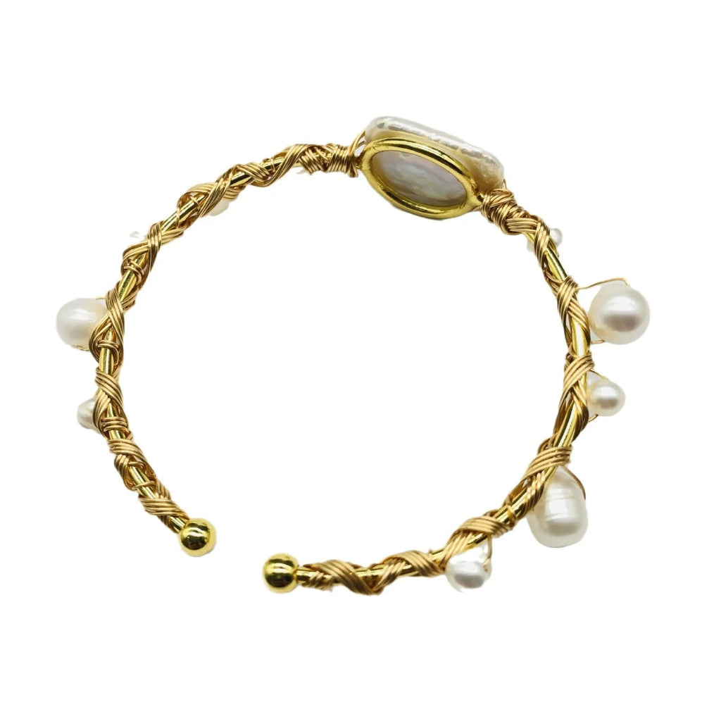 Natural freshwater pearl handmade wire-wrapped bracelet in gold titanium steel on wrist
