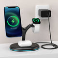 Black multifunctional three-in-one magnetic wireless charger on a desk