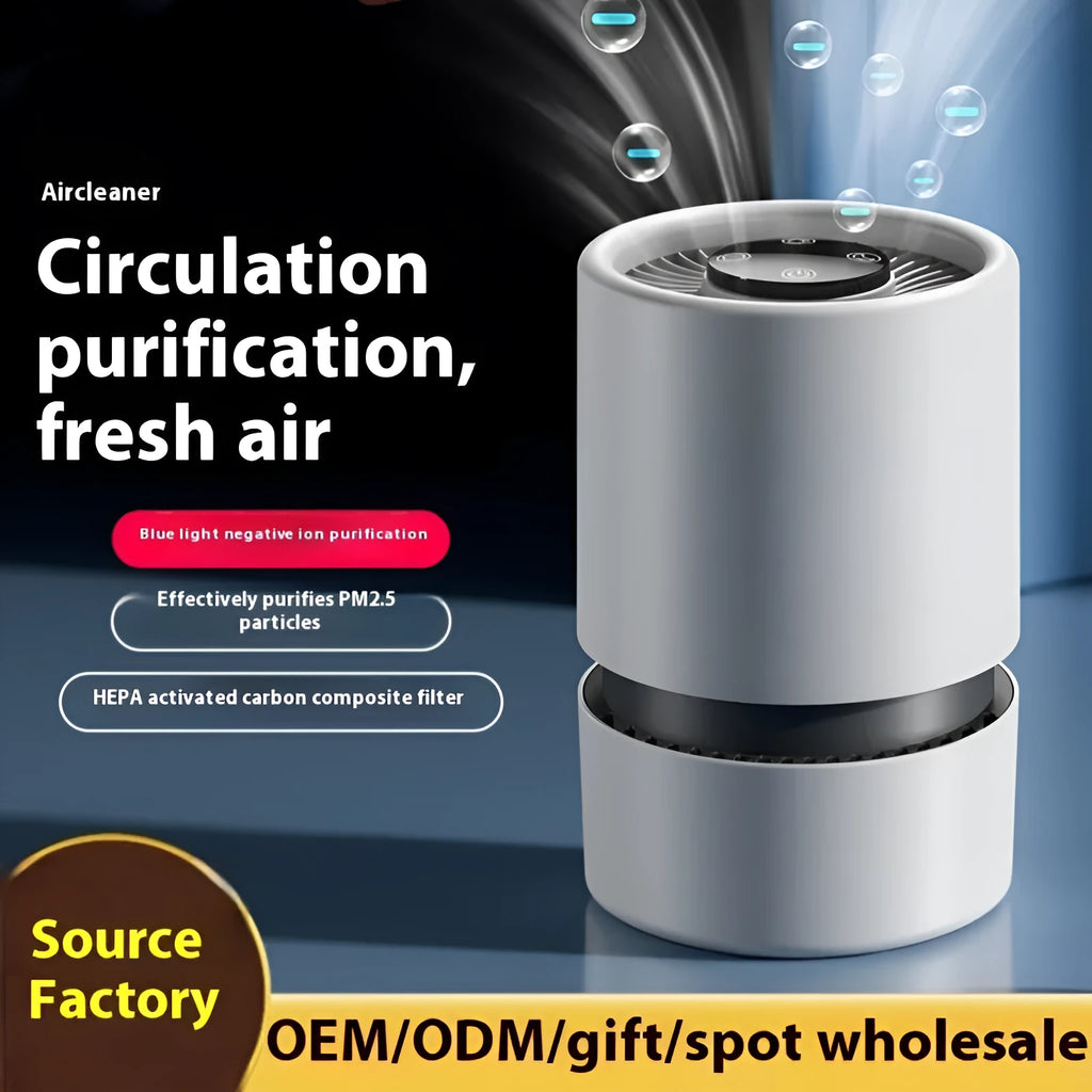 White simple-style desktop air purifier with USB cable on a wooden desk.