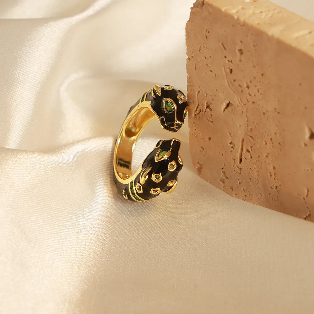 Women's copper cheetah print open ring with geometric design in black electroplated finish