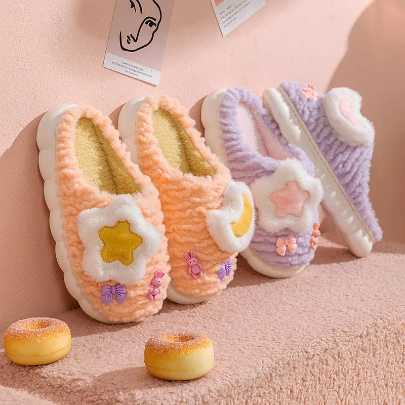 Light blue cartoon animal pattern women's fleece-lined slippers with round toe and PVC sole.