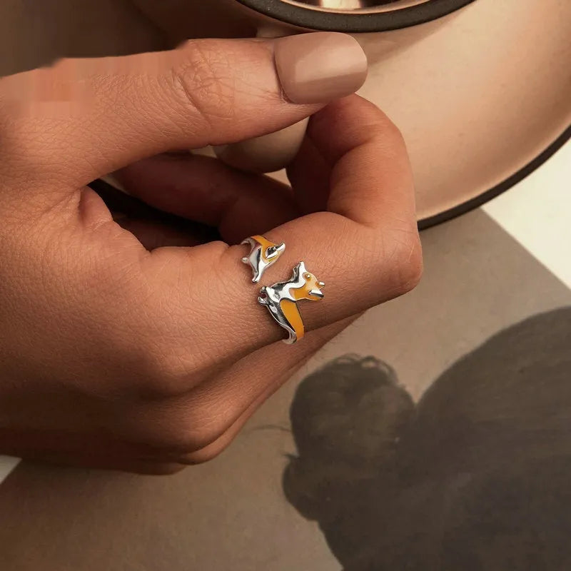Sterling silver adjustable ring with a detailed cartoon Corgi design and electroplated finish.