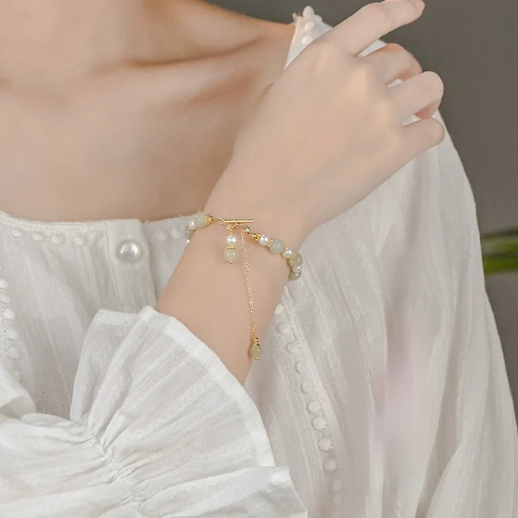 Women's Hetian jade bracelet with gold electroplated chain and pendant in Chinese style
