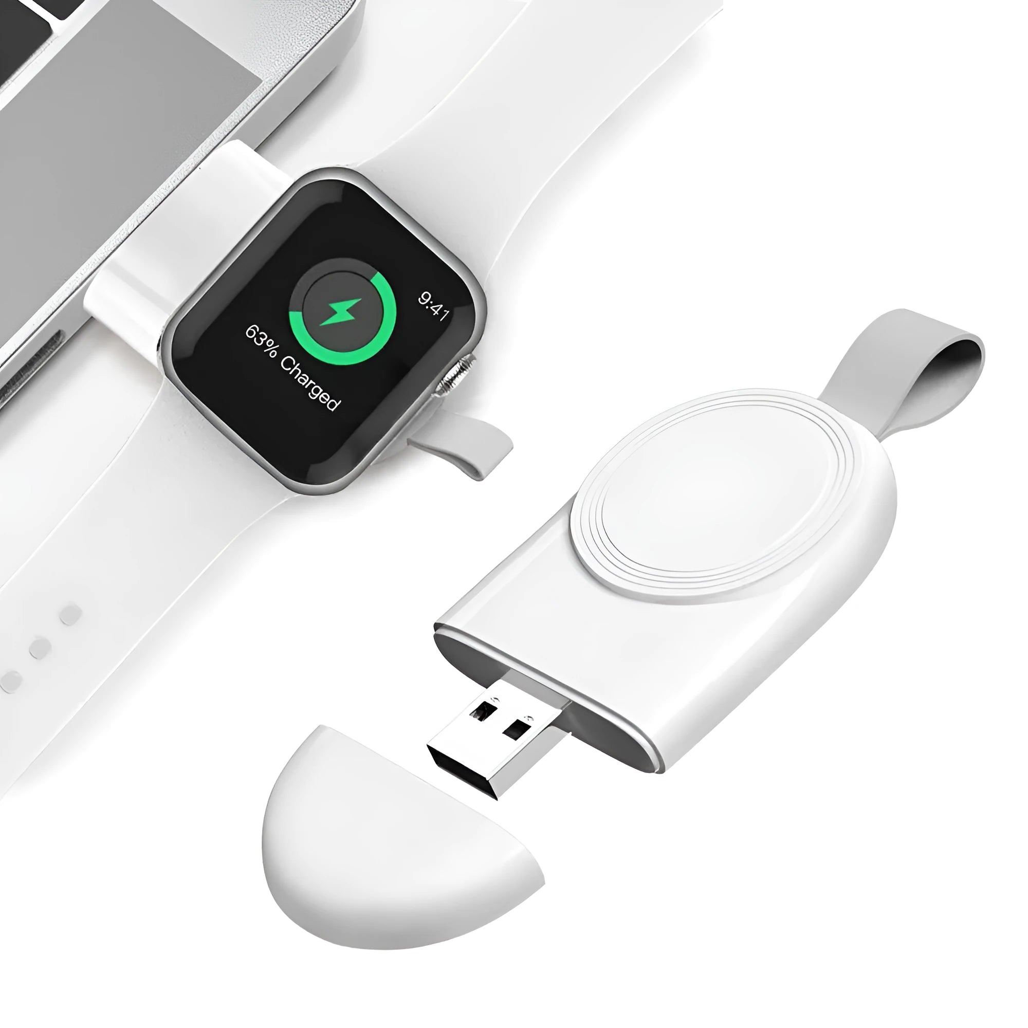 Portable white wireless charging dock for Apple Watch on a desk next to a laptop.