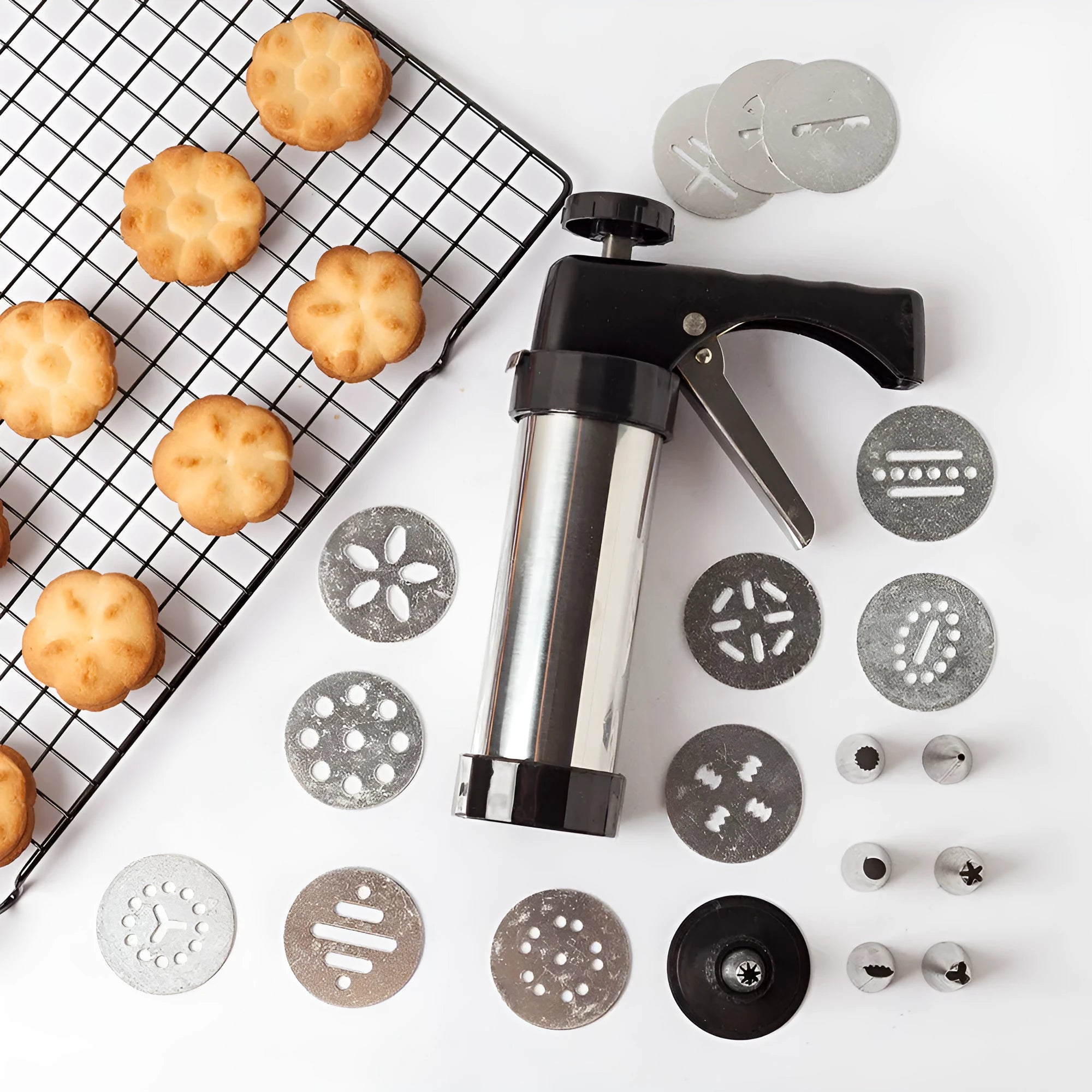 Stainless steel biscuit press machine with cookie moulds and pastry nozzles for baking