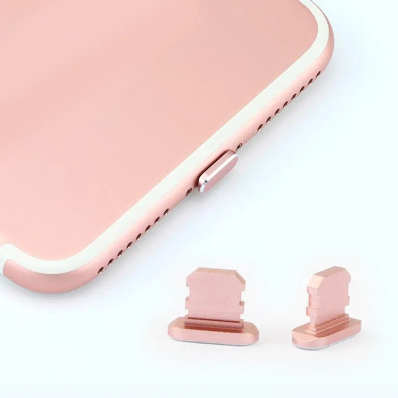 Aluminium alloy iPhone charging port dust plug in gold, silver, blue, red, grey, black, and rose gold colours.