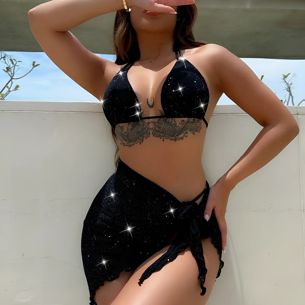 Black women's three-piece bikini swimsuit set with halterneck top and shorts on a mannequin.