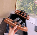 Women's retro Roman-style sandal slippers in genuine sheepskin leather with patent leather finish