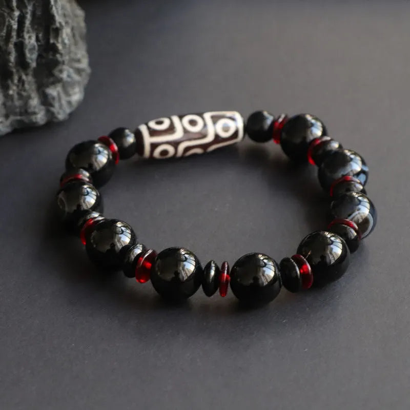 Hand-woven black agate dzi bead bracelet with 11mm geometric beads