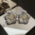 Retro textured copper stud earrings with gardenia floral design in E3002 two-tone colour