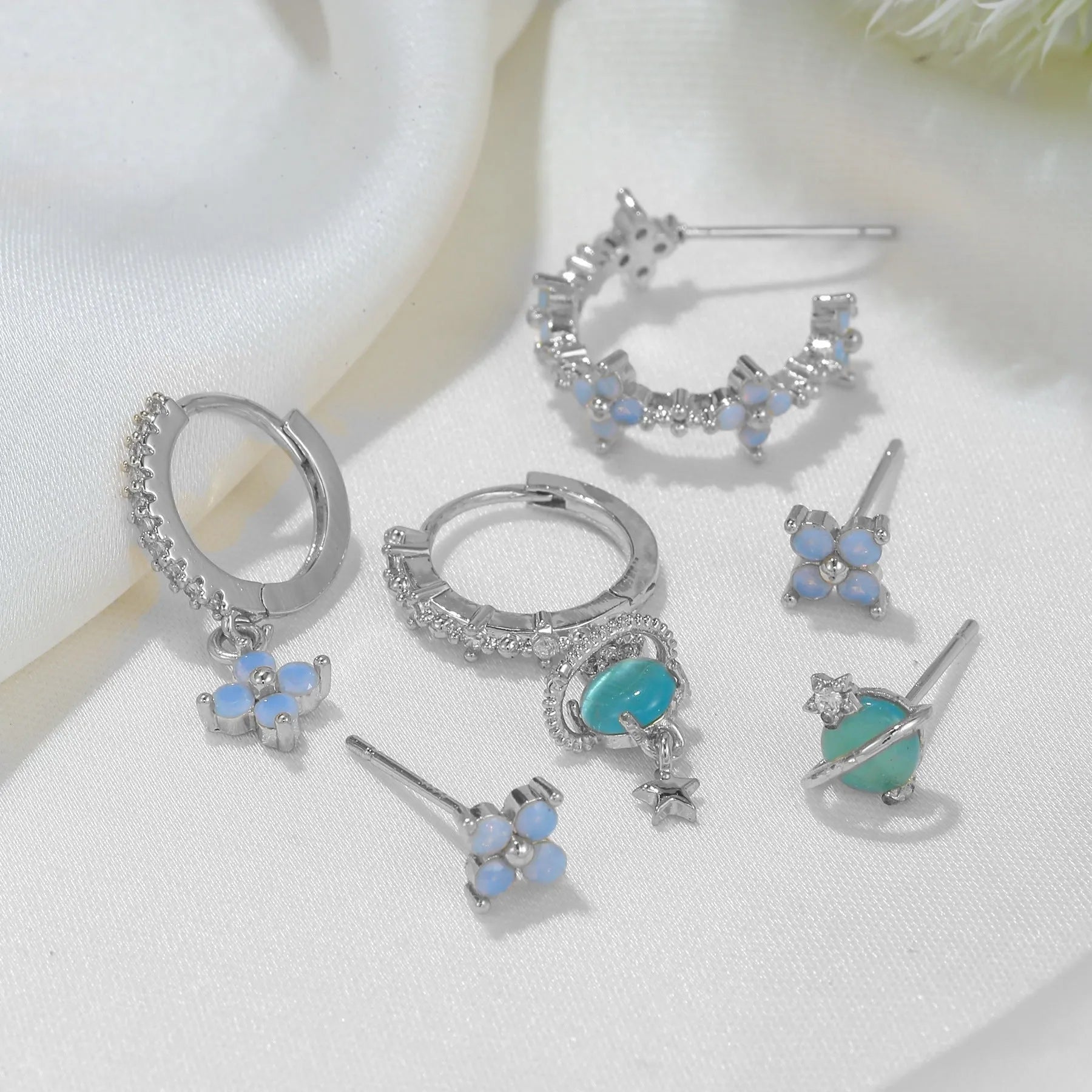 Japanese Korean style flower earrings with blue protein nail design and zircon accents in gold or silver colour