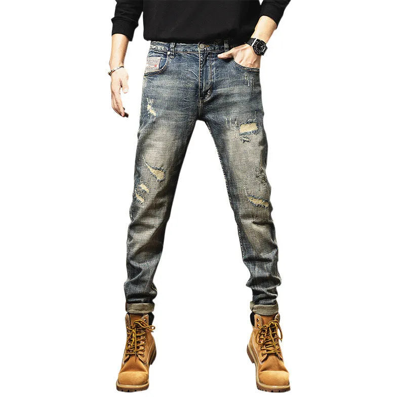 Man wearing vintage blue loose-fit jeans with a drawstring waist, showcasing the fleece-lined interior.