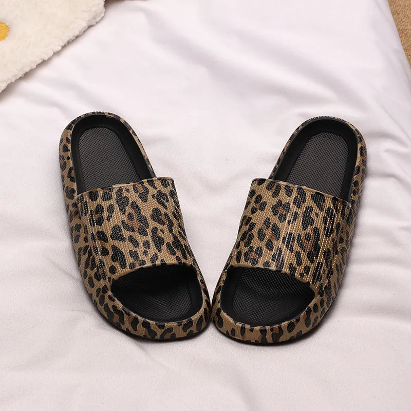 Women's leopard print EVA slippers with thick sole on a white background