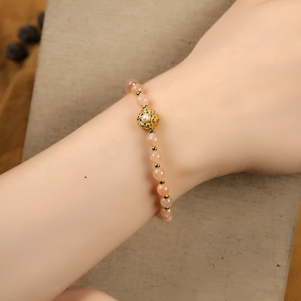 Hand-woven crystal bracelet with gray moonstone, sunstone, and strawberry quartz 6mm beads