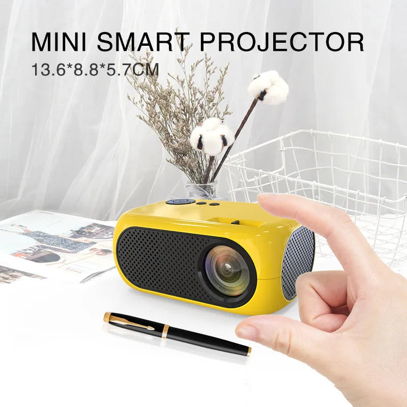 M24 micro mini portable LED projector in gold or white colour with power adapter and AV cable