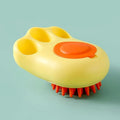 Blue silicone claw pet bath brush for washing cats and dogs on a white background.
