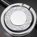 Bling glitter plating metal phone ring holder showing 360-degree rotation on a smartphone.