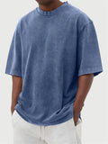 Men's loose fit distressed polyester t-shirt in stone washed solid colours