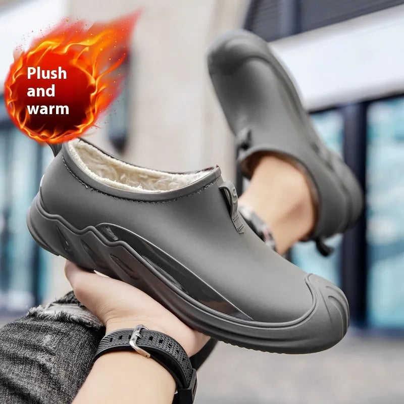 Men's short plastic rain boots in ankle-height wellington style available in multiple colours